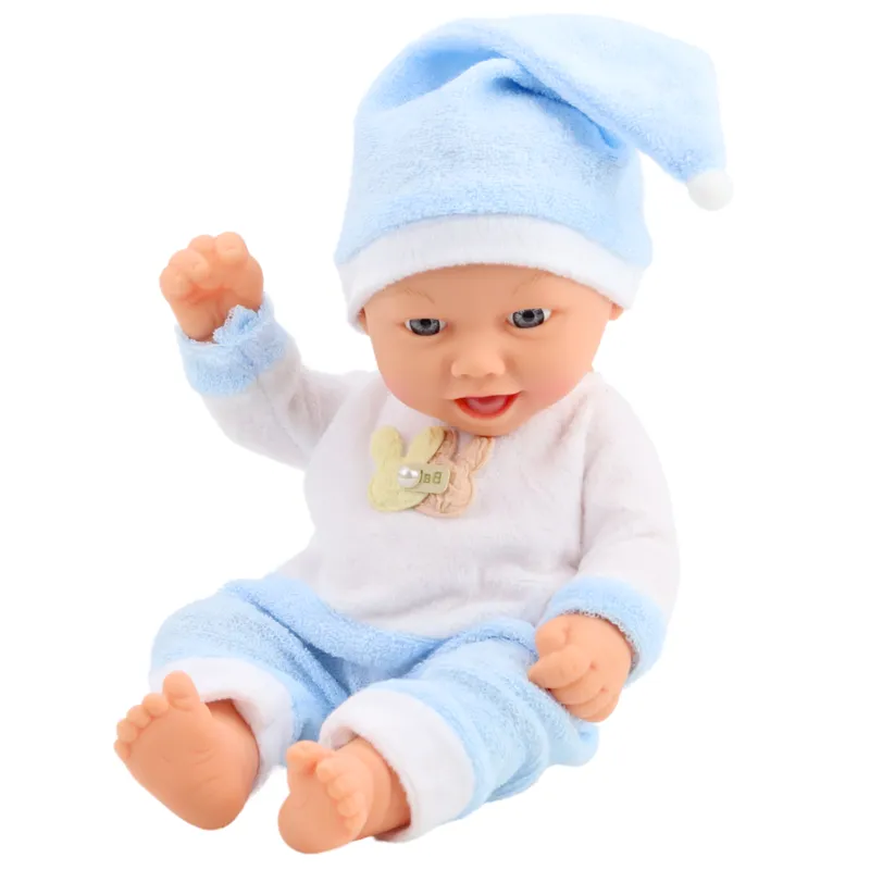 Babydocka i blå pyjamas med Pom-Pom-hatt