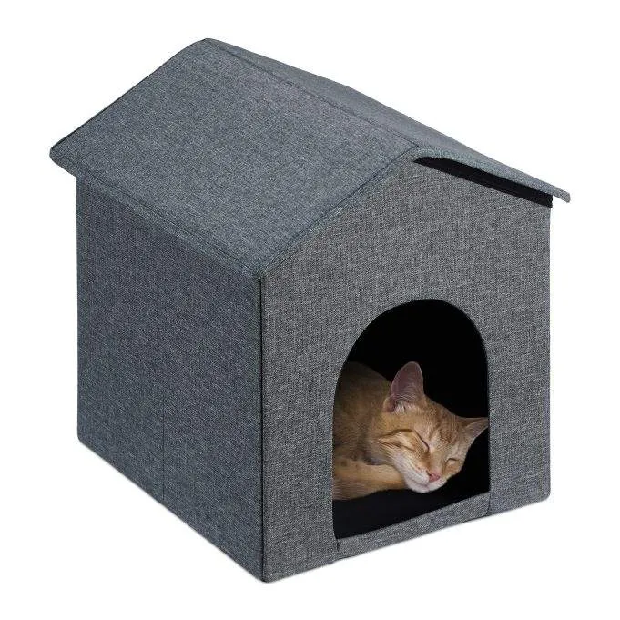 Kattgrotta med grått tak